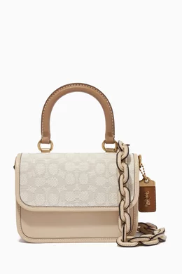 Shop Coach White Rogue Top Handle Bag in Signature Jacquard for WOMEN |  Ounass Saudi Arabia