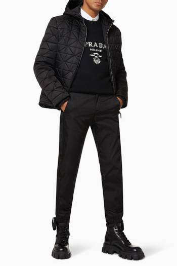 hover state of Triangle Logo Hooded Bomber Jacket in Quilted Re-Nylon   
