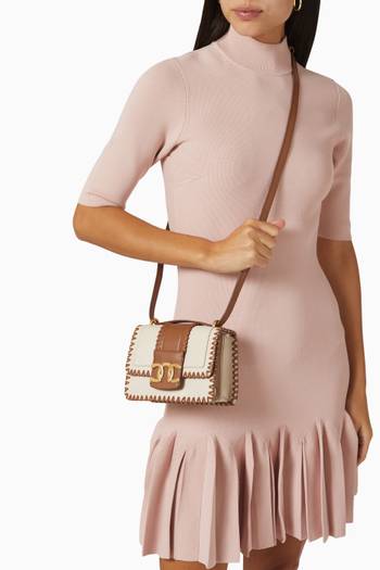 hover state of Edasina Whipstitch Mini Crossbody Bag in Leather