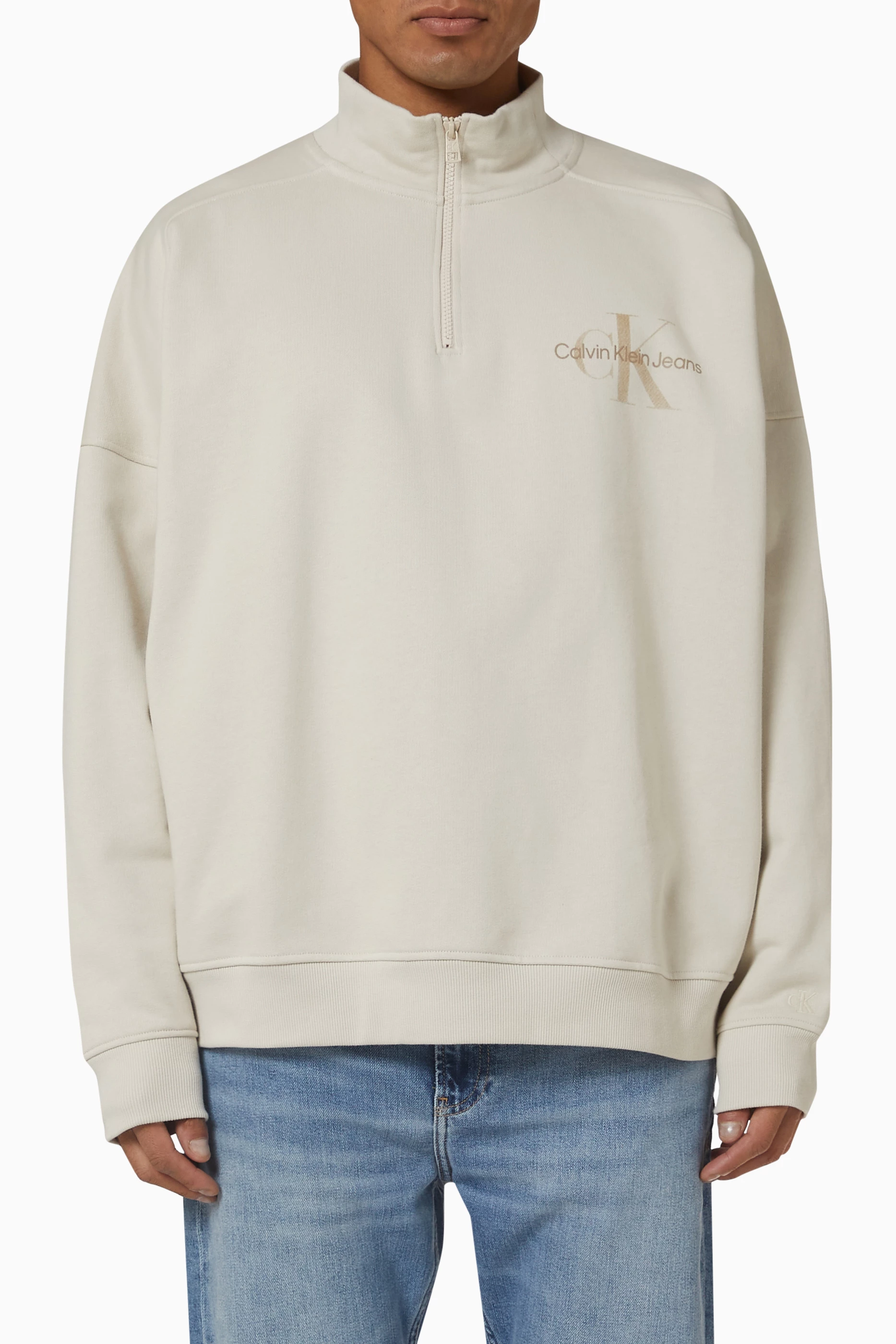 Shop Calvin Klein Jeans Neutral Half-zip Logo Sweatshirt in Organic  Cotton-blend for MEN | Ounass UAE